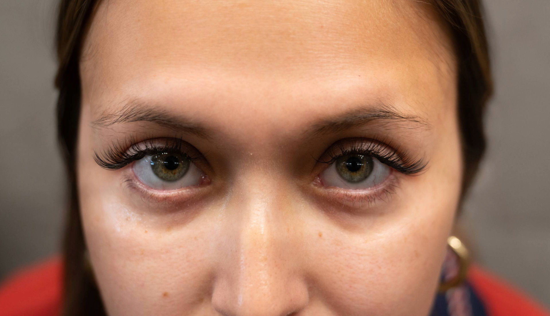Front view of volume lash extensions, green eyes